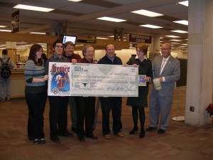 ULAC representatives present the check to library dean, Bonnie Allen.